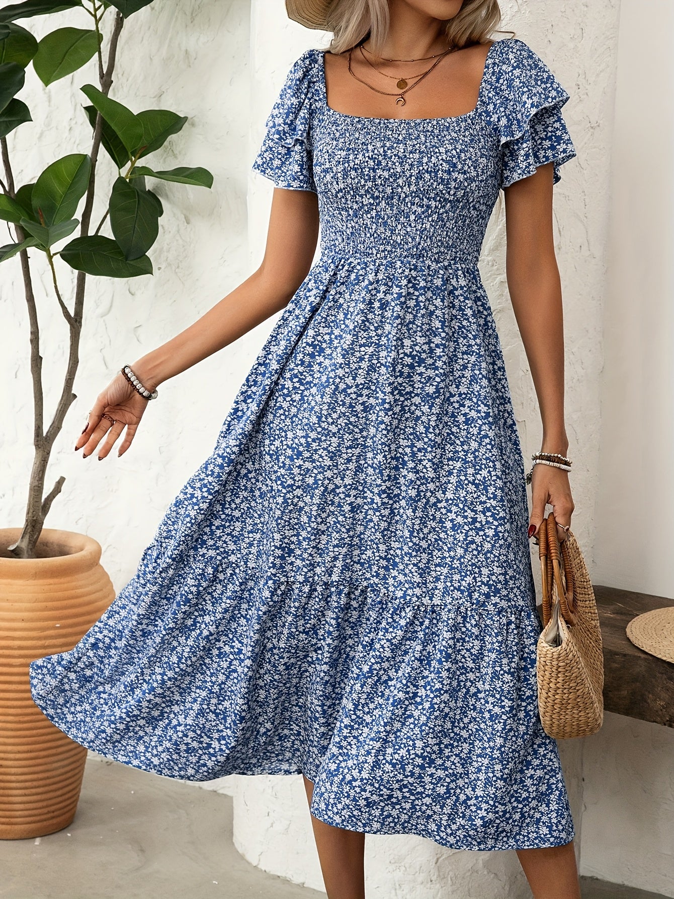 Florine | Midi-jurk met bloemenprint en rucherand