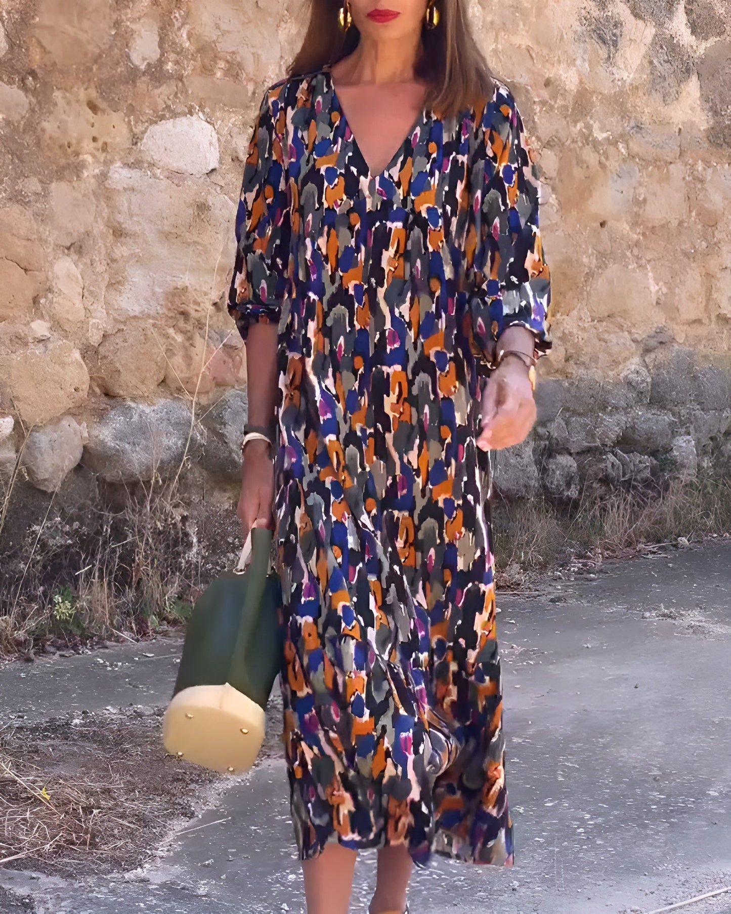 Renée | Vintage jurk met V-hals en romantische mouwen