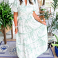 Aurélie | Maxi-jurk met groene toileprint en smocktaille