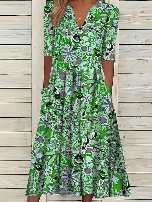 Odette | Midi-jurk met bloemenprint, V-hals en asymmetrische zoom