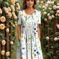 Yvette | Elegante midi-jurk met plissé en zakken