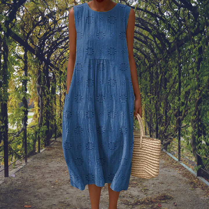 Penelope | Sleeveless Flowing Midi Dress