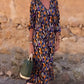 Renée | Vintage jurk met V-hals en romantische mouwen