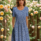 Yvette | Elegante midi-jurk met plissé en zakken