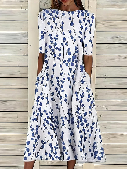 Céleste | Midi-zomerjurk met kustbloemen en ronde hals