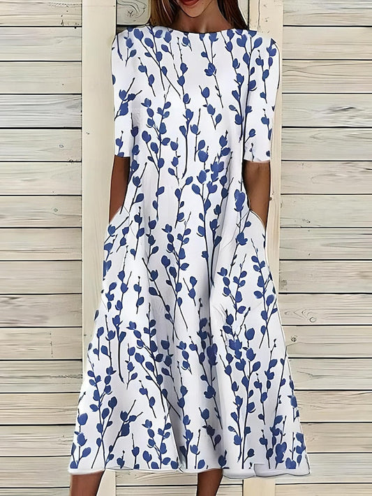 Céleste | Midi-zomerjurk met kustbloemen en ronde hals