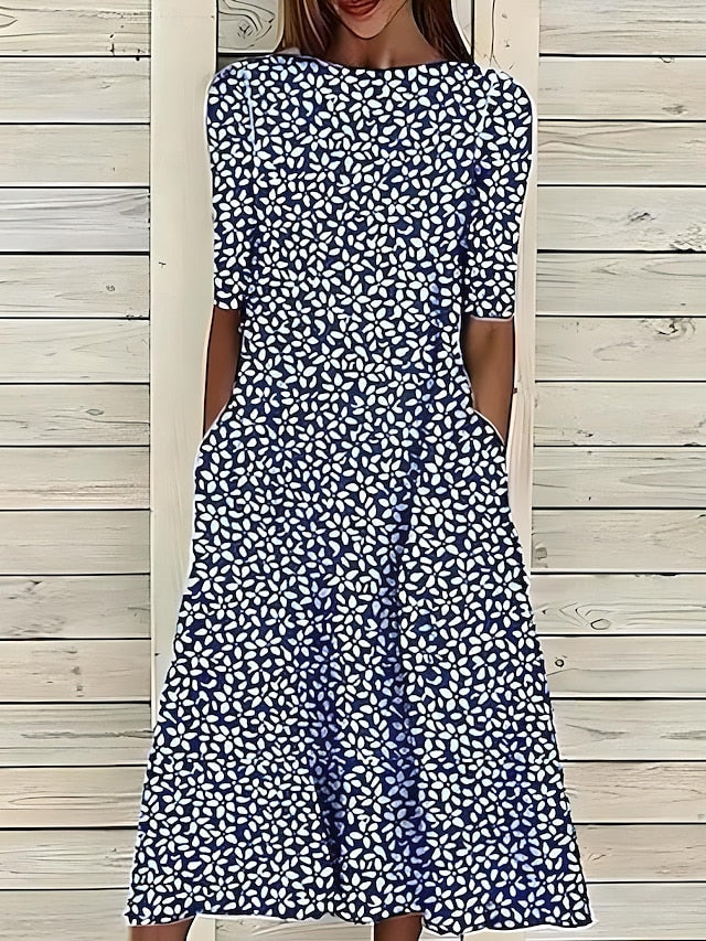 Céleste | Midi-zomerjurk met kustbloemen en ronde hals